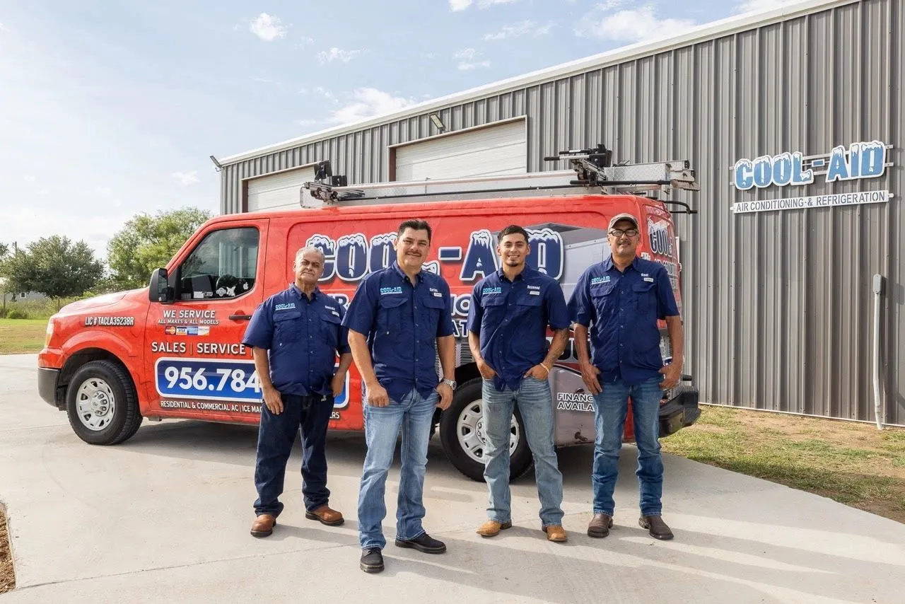 Carlos and the Cool Aid Air Conditioning team in front of their service truck in Edinburg, TX